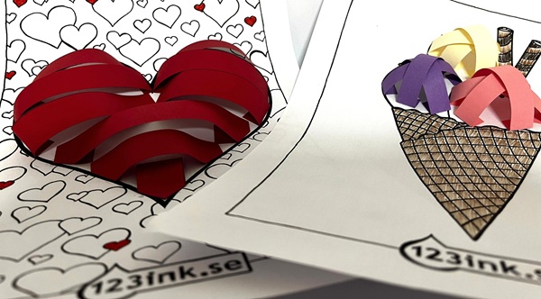 Färgglada 3D‑pappersmotiv med hjärta och glass på målarbilder, skapade som kreativt pyssel.